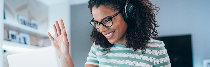 Women on laptop with headphones